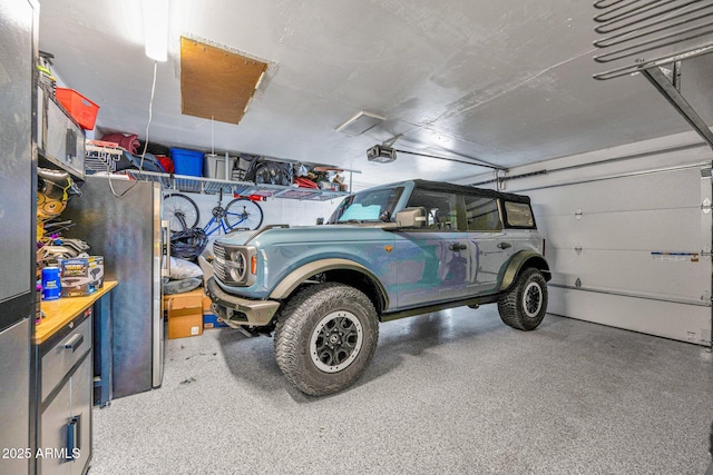 8730 E Montecito Ave, Scottsdale, AZ 85251 - garage featuring a garage door opener