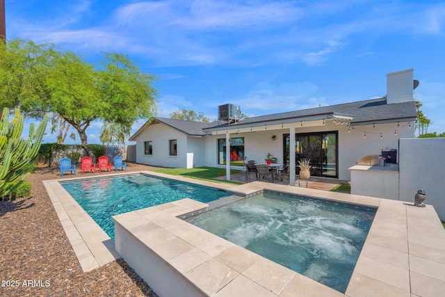 8730 E Montecito Ave, Scottsdale, AZ 85251 - view of pool with cooling unit, a patio area, a fenced backyard, and a pool with connected hot tub