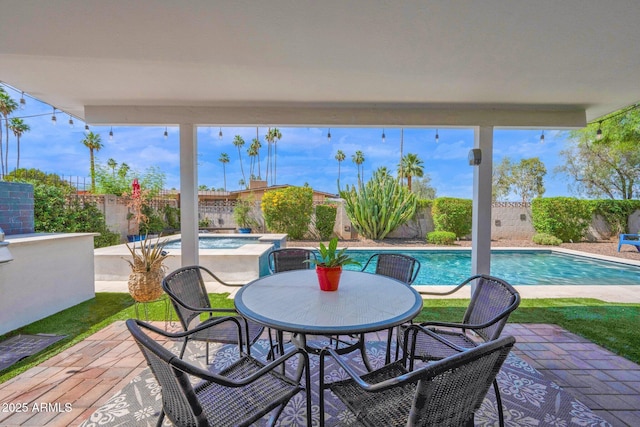 8730 E Montecito Ave, Scottsdale, AZ 85251 - fenced backyard with a patio and a pool with connected hot tub