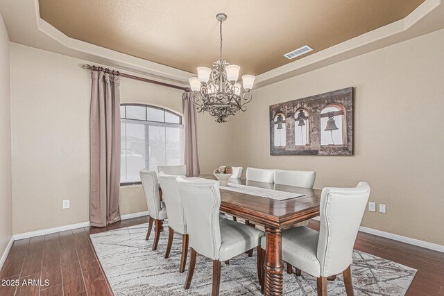 23644 N 67th Ave, Peoria, AZ 85383 - dining room with a tray ceiling, visible vents, and baseboards