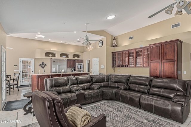 23644 N 67th Ave, Peoria, AZ 85383 - living room with light tile patterned floors, high vaulted ceiling, ceiling fan, and visible vents
