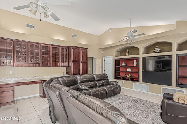 23644 N 67th Ave, Peoria, AZ 85383 - living area featuring built in features, a ceiling fan, light tile patterned floors, lofted ceiling, and visible vents