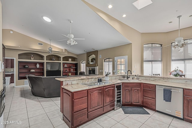23644 N 67th Ave, Peoria, AZ 85383 - kitchen with ceiling fan, black electric stovetop, a sink, beverage cooler, and stainless steel dishwasher
