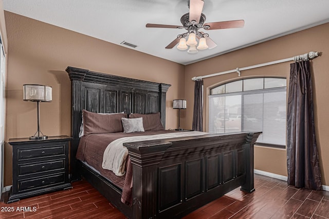 23644 N 67th Ave, Peoria, AZ 85383 - bedroom featuring a ceiling fan, wood finish floors, visible vents, and baseboards