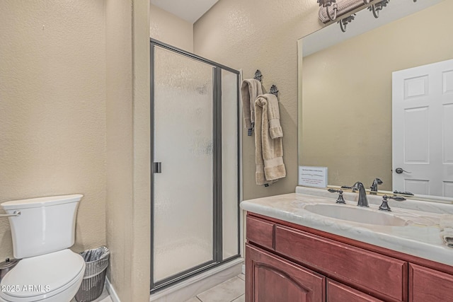 23644 N 67th Ave, Peoria, AZ 85383 - bathroom featuring toilet, tile patterned floors, a shower stall, and vanity
