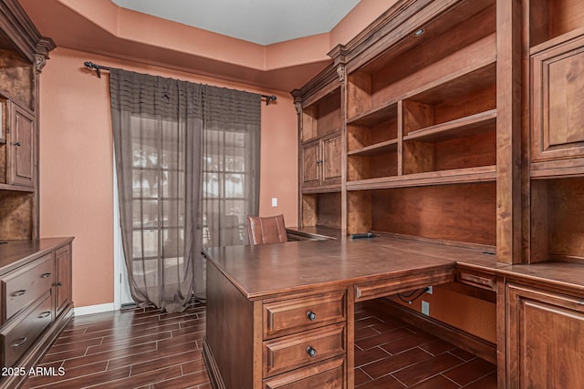 23644 N 67th Ave, Peoria, AZ 85383 - unfurnished office featuring baseboards, built in desk, and wood tiled floor