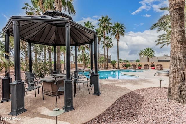 23644 N 67th Ave, Peoria, AZ 85383 - view of pool featuring a gazebo, a fenced in pool, fence, a patio, and a fire pit