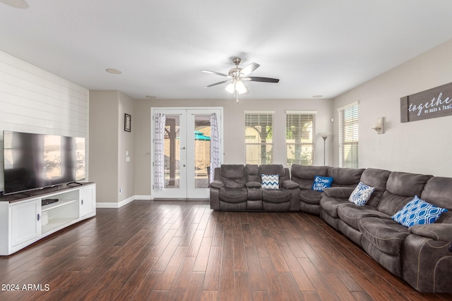 unfurnished living room with dark wood-type flooring, ceiling fan, and french doors