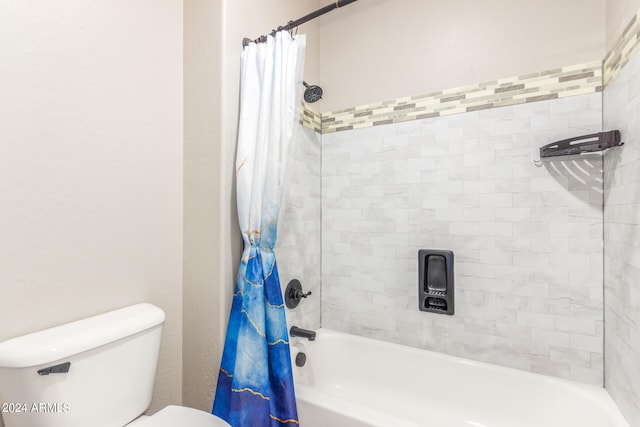 bathroom featuring toilet and shower / bath combo