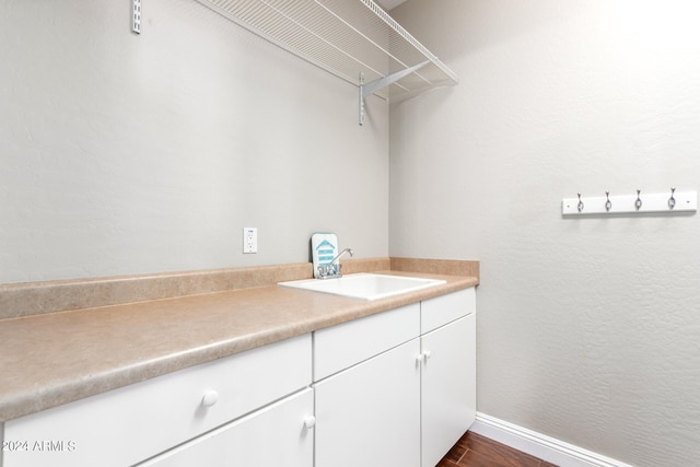 bathroom with vanity and wood-type flooring