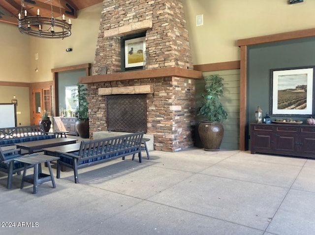 view of patio with an outdoor stone fireplace