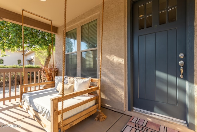 doorway to property with covered porch