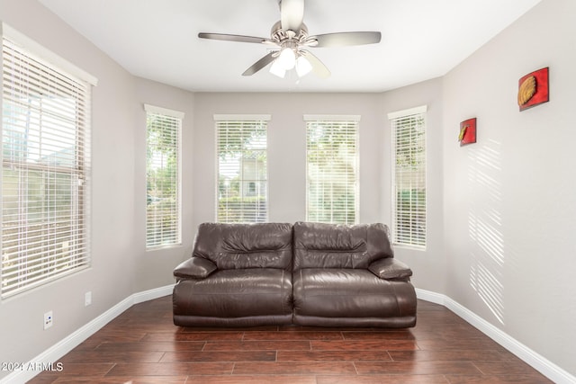 living area with ceiling fan