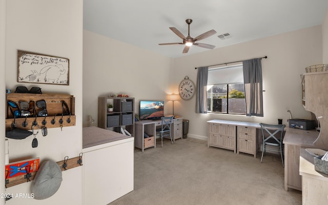 office featuring ceiling fan and light colored carpet