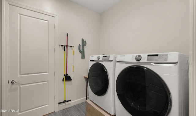 laundry area with washing machine and dryer