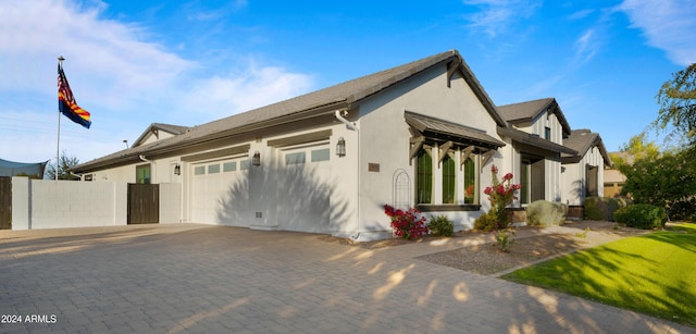 view of front of home with a garage