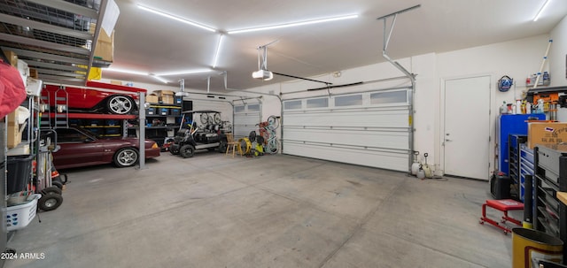 garage featuring a garage door opener