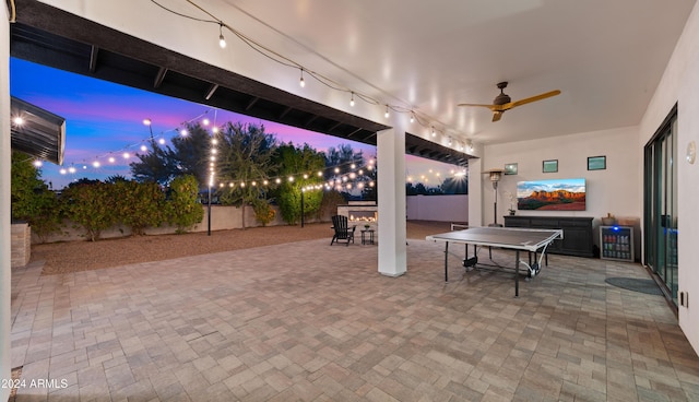 patio terrace at dusk with ceiling fan