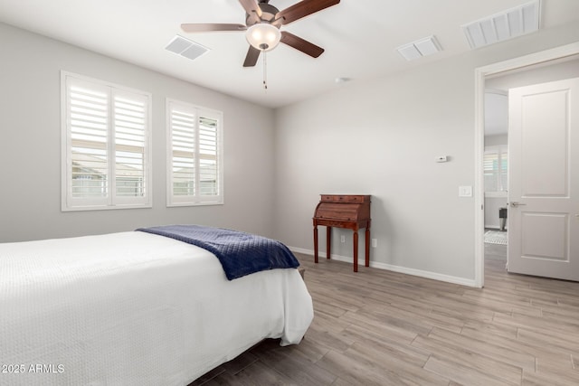 3474 W Dreamy Draw Dr, Queen Creek, AZ 85144 - bedroom with light wood-type flooring, baseboards, and a ceiling fan