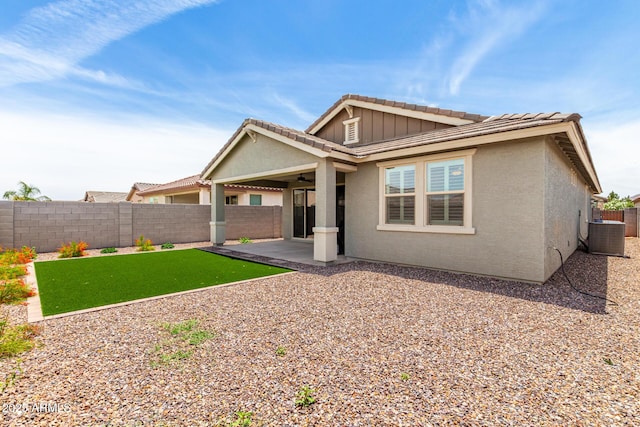 3474 W Dreamy Draw Dr, Queen Creek, AZ 85144 - back of house featuring a fenced backyard, a patio, a tiled roof, ceiling fan, and stucco siding