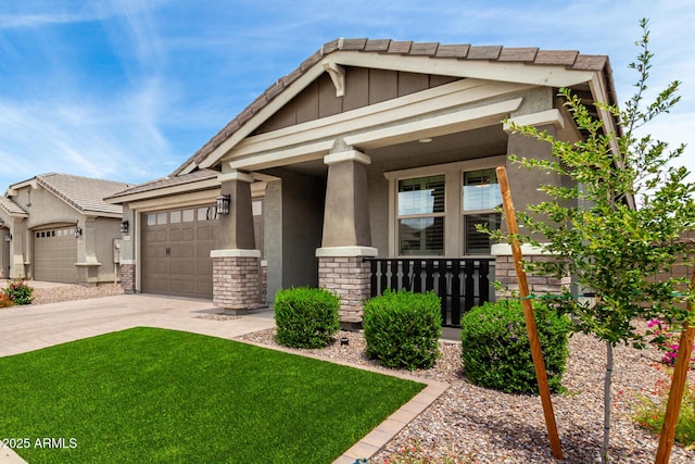 3474 W Dreamy Draw Dr, Queen Creek, AZ 85144 - craftsman-style house with concrete driveway, an attached garage, board and batten siding, covered porch, and stucco siding