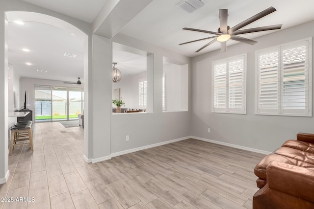 3474 W Dreamy Draw Dr, Queen Creek, AZ 85144 - unfurnished room featuring ceiling fan, baseboards, and light wood finished floors
