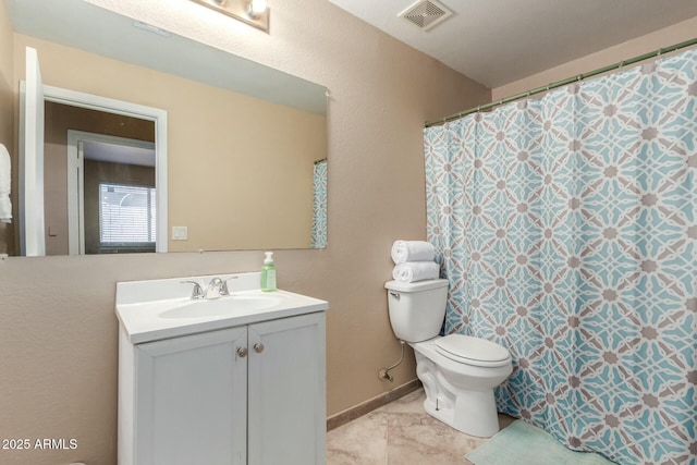 full bathroom with baseboards, visible vents, vanity, and toilet