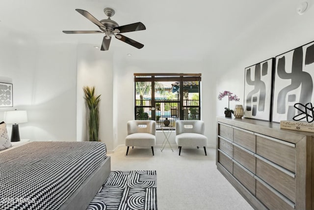 bedroom with baseboards, ceiling fan, and carpet