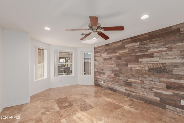 empty room with ceiling fan