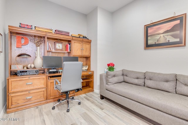 office space with light wood-style flooring