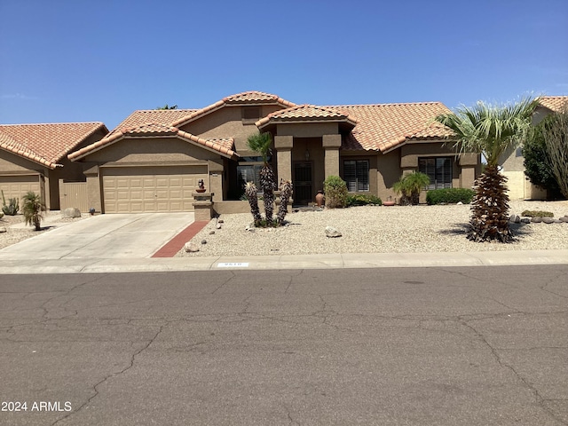 view of front of property with a garage