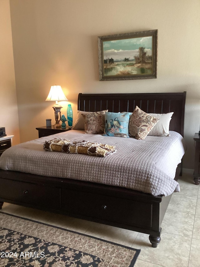 bedroom with light tile patterned flooring