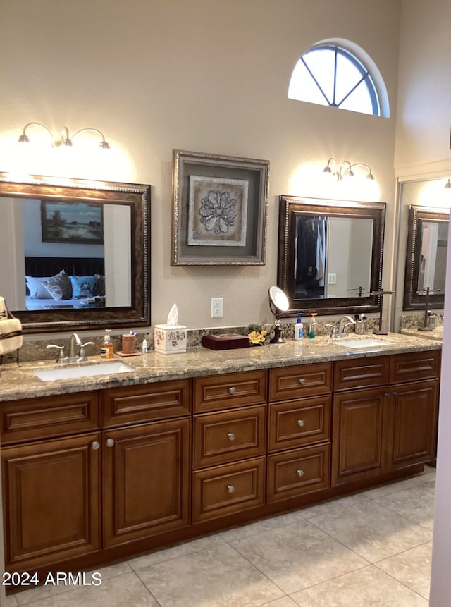 bathroom with vanity and tile patterned floors