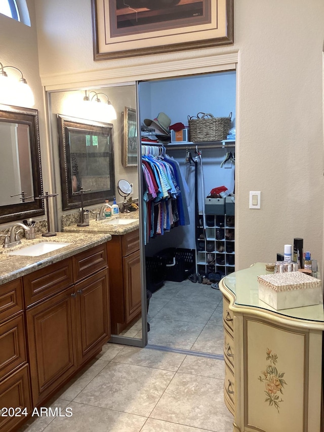 bathroom featuring vanity and tile patterned flooring