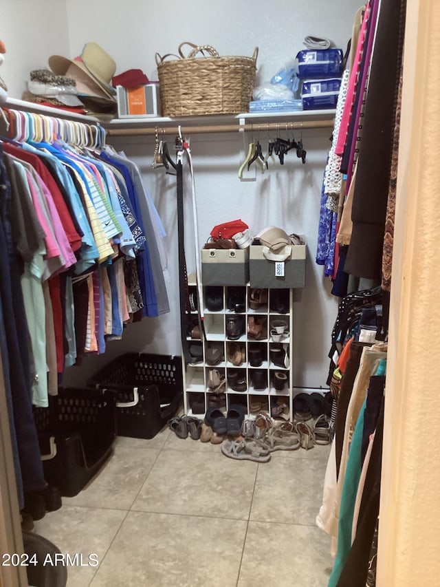 spacious closet with tile patterned flooring