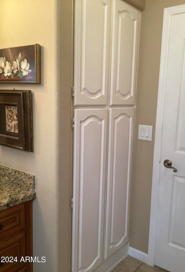 interior details with tile patterned flooring