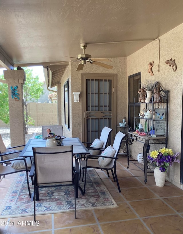 view of patio / terrace featuring ceiling fan