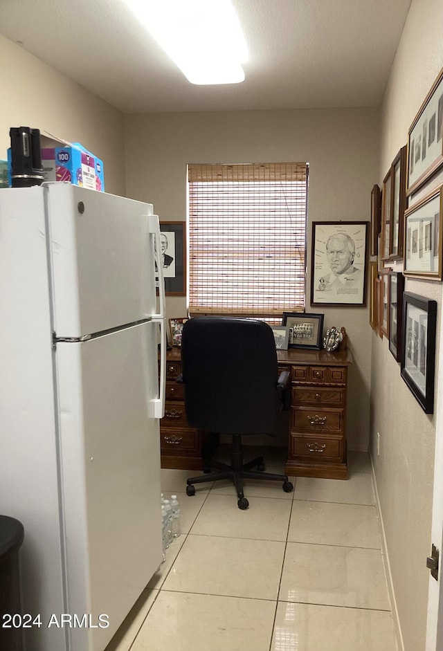 office with light tile patterned flooring