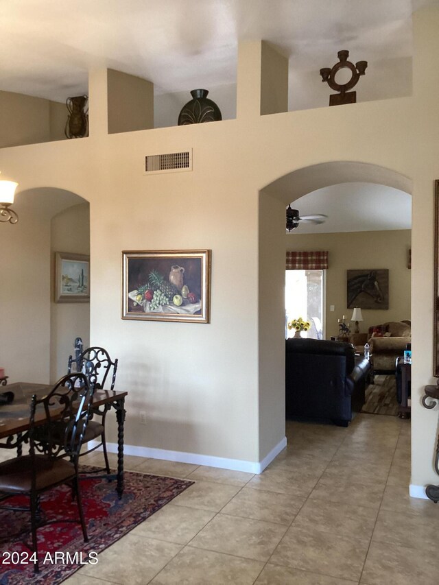 interior space featuring ceiling fan