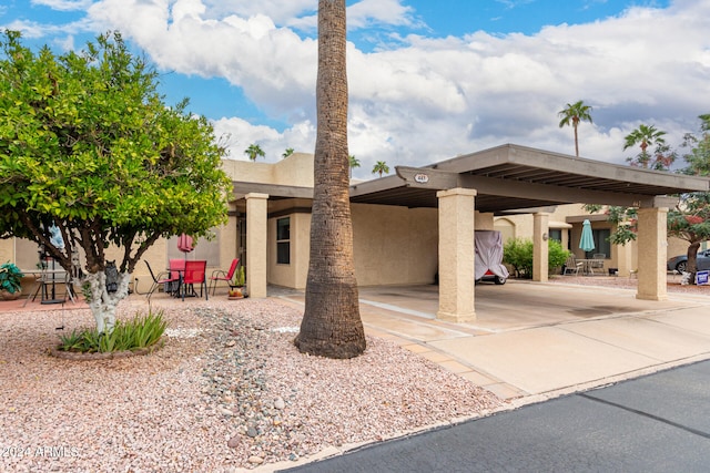 southwest-style home featuring a patio area