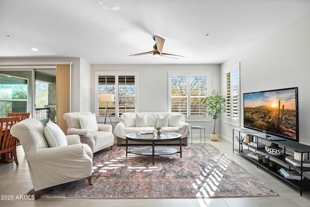 living room featuring ceiling fan