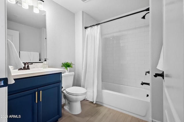 full bathroom with toilet, wood-type flooring, shower / bathtub combination with curtain, and vanity