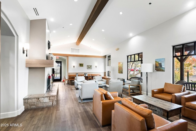 living room featuring high vaulted ceiling, dark wood-type flooring, and beam ceiling