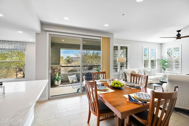 dining space featuring ceiling fan