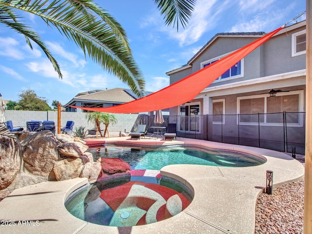 16322 N 171st Dr, Surprise, AZ 85388 - view of swimming pool with fence, a pool with connected hot tub, and a patio area