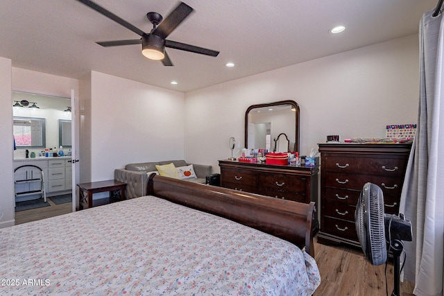2714 E Valencia Dr, Phoenix, AZ 85042 - bedroom featuring wood finished floors, ensuite bathroom, recessed lighting, and a ceiling fan