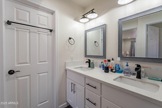 2714 E Valencia Dr, Phoenix, AZ 85042 - bathroom featuring double vanity