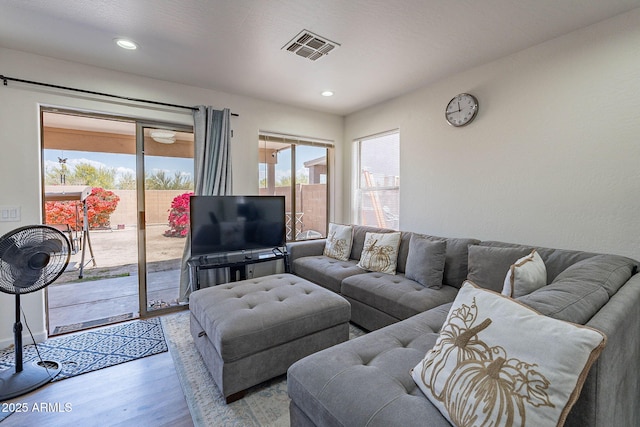 2714 E Valencia Dr, Phoenix, AZ 85042 - living area featuring wood finished floors and recessed lighting
