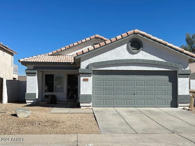 view of front of home with a garage