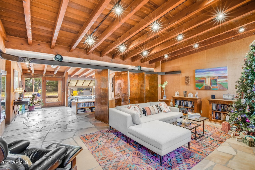 living room with beamed ceiling and wooden ceiling